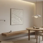 Minimalist textured wall art depicting organic topographic contours in cream and white tones, contemporary dining space
