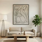 Minimalist black ink line drawing on cream hand-painted canvas with gestural abstract forms, contemporary living space
