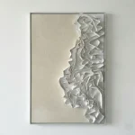 Textured abstract hand-painted canvas with layered white relief forms and organic contours in cream and silver tones