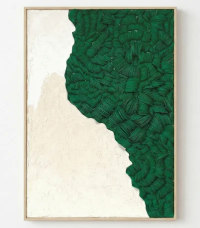 Minimalist hand-painted canvas with organic leaf silhouette in deep forest green and cream, contemporary living space