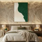 Textured abstract hand-painted canvas in deep forest green and cream with organic brushwork, contemporary bedroom