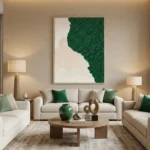 Contemporary minimalist hand-painted canvas featuring organic green foliage composition with negative space, cream and forest green palette, modern living space