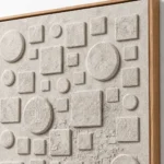 Loose Mosaic textured wall art shown framed on the wall in a styled interior
