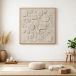 Textured abstract hand-painted canvas in cream and ivory with dimensional circles and squares, minimalist meditation space