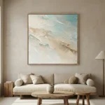 Textured abstract hand-painted canvas in soft cream, ivory, and sage tones with layered impasto brushwork, contemporary living space
