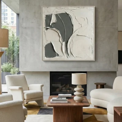 Textured abstract hand-painted canvas in cream and charcoal with layered gestural brushstrokes, contemporary living space