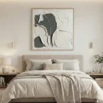Textured abstract hand-painted canvas with layered cream and charcoal gestural forms, modern bedroom