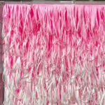 Textured abstract hand-painted canvas in layered hot pink, white, and coral brushstrokes with dynamic gestural movement
