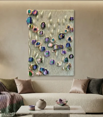 Textured abstract hand-painted canvas with iridescent circular forms in jewel tones against rippled cream background, contemporary living space