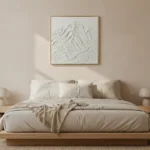 Textured minimalist hand-painted canvas depicting layered mountain peaks in monochromatic white and cream tones, contemporary bedroom