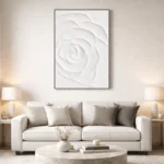 Minimalist monochrome hand-painted canvas of a delicate rose in soft white tones, contemporary living space