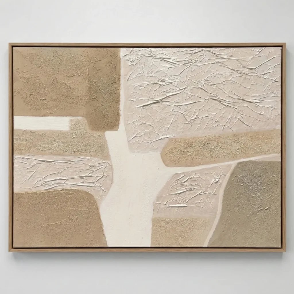Textured abstract hand-painted canvas in layered cream and sand tones with gestural brushwork, contemporary interior