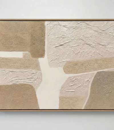 Textured abstract hand-painted canvas in layered cream and sand tones with gestural brushwork, contemporary interior