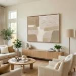 Textured abstract hand-painted canvas in cream and taupe tones with layered gestural marks, contemporary living space