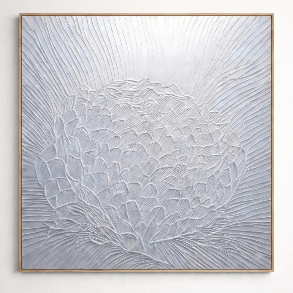 Textured monochrome hand-painted canvas depicting layered dahlia petals in dimensional white relief strokes, contemporary wall space
