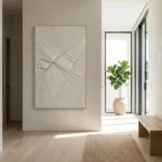 Minimalist abstract hand-painted canvas with intersecting linear gestural marks in warm neutral tones, contemporary entryway