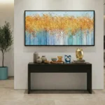 Contemporary abstract hand-painted canvas with layered golden wheat and blue-green striped texture, modern entryway