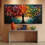 Textured contemporary hand-painted canvas depicting a vibrant tree with multi-colored foliage in reds, oranges, yellows, and greens against a moody teal cityscape backdrop