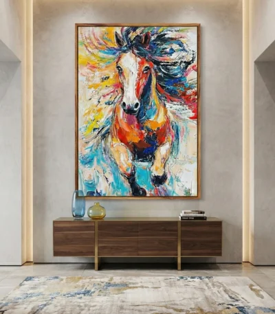 Gestural expressionist hand-painted canvas of a vibrant galloping horse in dynamic multi-colored brushstrokes, contemporary entryway