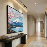 Impressionist hand-painted canvas of Mount Fuji with cherry blossoms, serene lake, and snow-capped peak in soft pink and blue tones, modern hallway