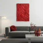 Textured abstract hand-painted canvas in deep crimson with gestural brushstrokes, contemporary living space