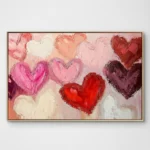 Gestural abstract hand-painted canvas with layered hearts in pink, red, cream and mauve tones, contemporary living space