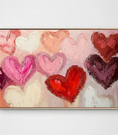Gestural abstract hand-painted canvas with layered hearts in pink, red, cream and mauve tones, contemporary living space