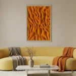 Gestural abstract hand-painted canvas in dynamic orange and amber tones with flowing organic forms, contemporary living space