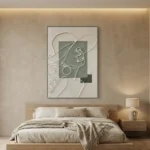 Contemporary minimalist hand-painted canvas featuring abstracted female portrait with continuous line drawing and geometric shapes in muted sage and cream, modern bedroom