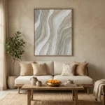 Textured abstract hand-painted canvas with flowing wavy lines in cream and soft taupe tones, contemporary living space