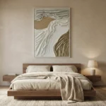 Textured abstract hand-painted canvas with flowing organic forms in cream, taupe and bronze tones, contemporary bedroom
