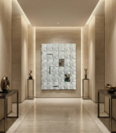 Textured abstract hand-painted canvas in quilted white relief with mirrored panel details, cream and neutral palette, contemporary gallery setting