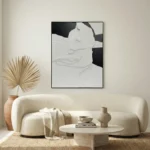 Minimalist hand-painted canvas with abstract linear profile in monochrome black and white, contemporary living space