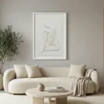 Textured minimalist hand-painted canvas depicting an abstract seated figure in cream and ivory tones, contemporary living space