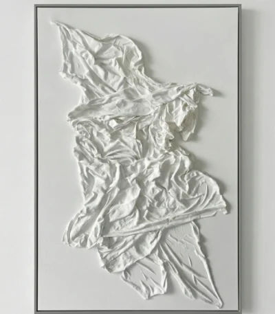 Textured monochrome hand-painted canvas of crumpled white fabric with layered dimensional folds and shadows