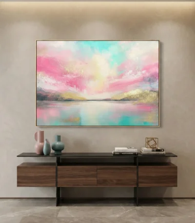 Contemporary landscape hand-painted canvas depicting serene lakeside mountains in soft pink, turquoise and gold tones, modern living space