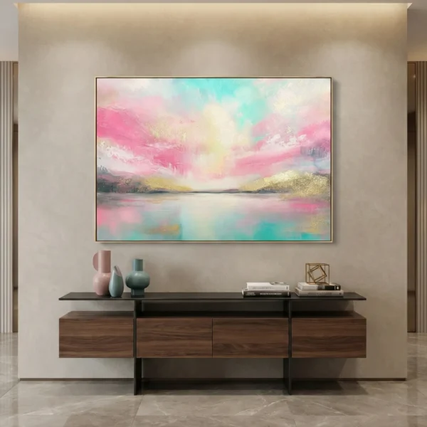 Contemporary landscape hand-painted canvas depicting serene lakeside mountains in soft pink, turquoise and gold tones, modern living space