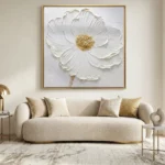 Textured contemporary hand-painted canvas depicting white peony with golden center in cream and gold palette, modern living space
