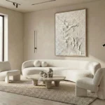 Textured figurative hand-painted canvas depicting graceful dancing figures in cream and ivory tones, contemporary living space
