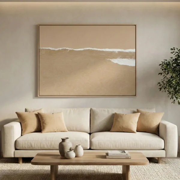 Minimalist landscape hand-painted canvas depicting soft waves and sandy beach in warm neutral tones, contemporary living space