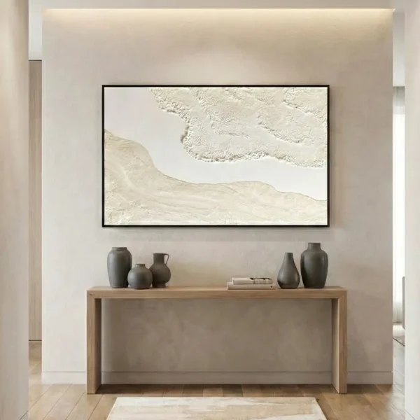 Textured abstract hand-painted canvas in cream and ivory tones with gestural brushwork, contemporary entryway