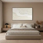 Minimalist textured hand-painted canvas in cream and ivory with subtle gestural brushwork, modern bedroom setting