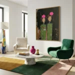 Gestural abstract hand-painted canvas featuring pink blooms and green vessels on dark background, contemporary living space