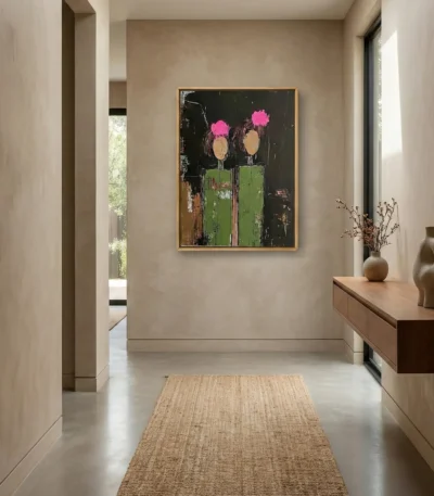 Gestural hand-painted canvas depicting two abstracted figures with vibrant pink blooms and green architectural forms on dark background, contemporary entryway