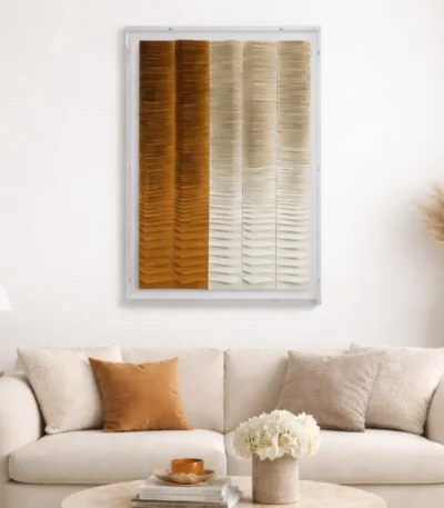 Textured abstract hand-painted canvas in warm ochre transitioning to cream tones with layered horizontal striations, contemporary living space