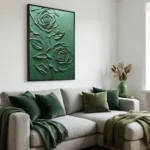 Textured hand-painted canvas featuring embossed green roses with layered botanical relief details, contemporary living space