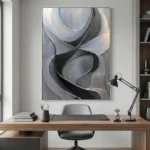 Layered abstract hand-painted canvas with intertwining curved forms in charcoal, white and grey tones, contemporary office