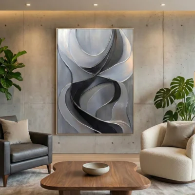 Abstract hand-painted canvas with flowing curved forms in charcoal, grey and cream tones, contemporary living space