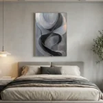 Gestural abstract hand-painted canvas in monochromatic grays and blacks with flowing curved forms, modern bedroom