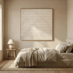 Minimalist textured hand-painted canvas with embossed circular relief pattern in cream and ivory tones, modern bedroom